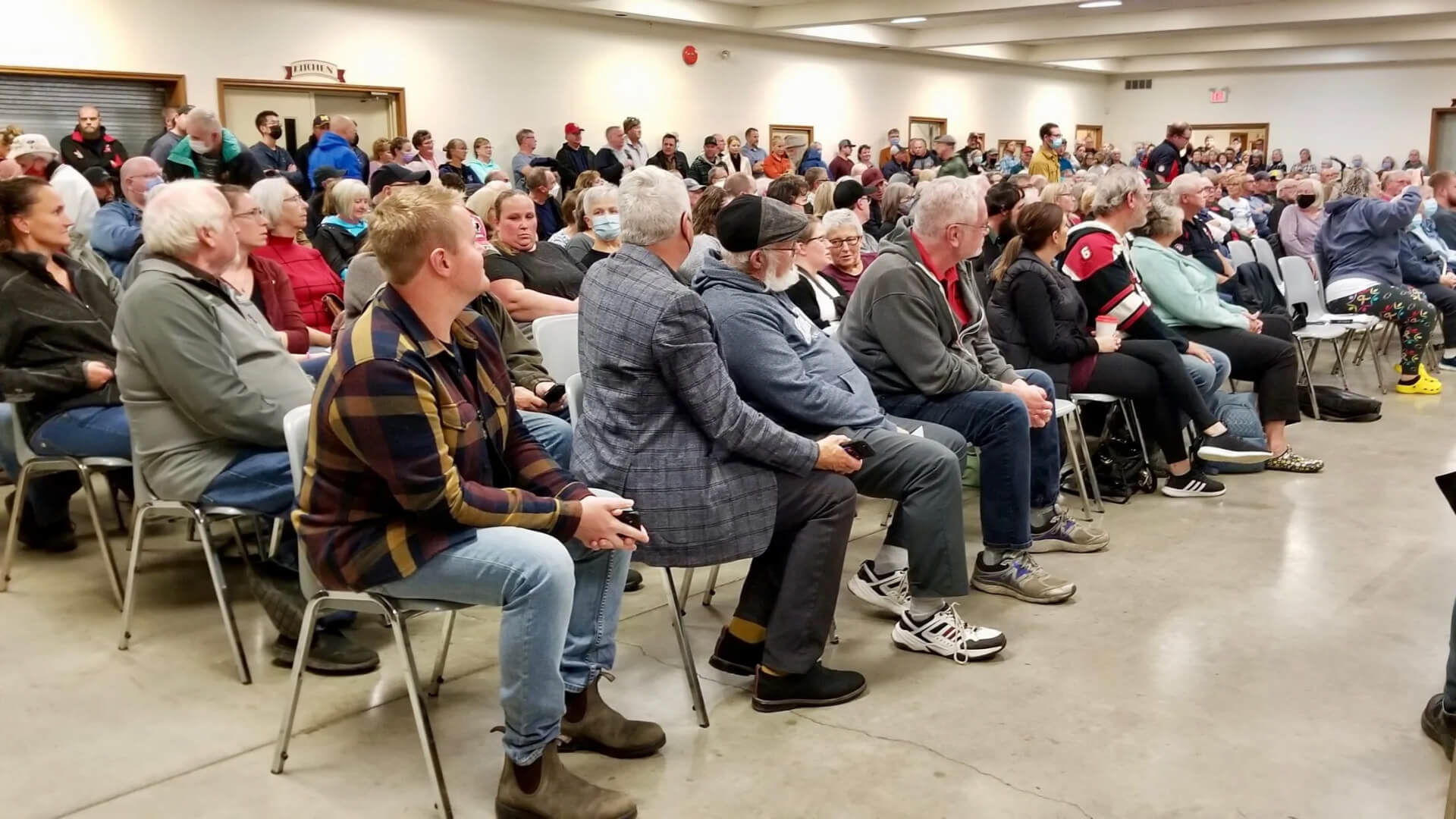 a group of people sitting in chairs