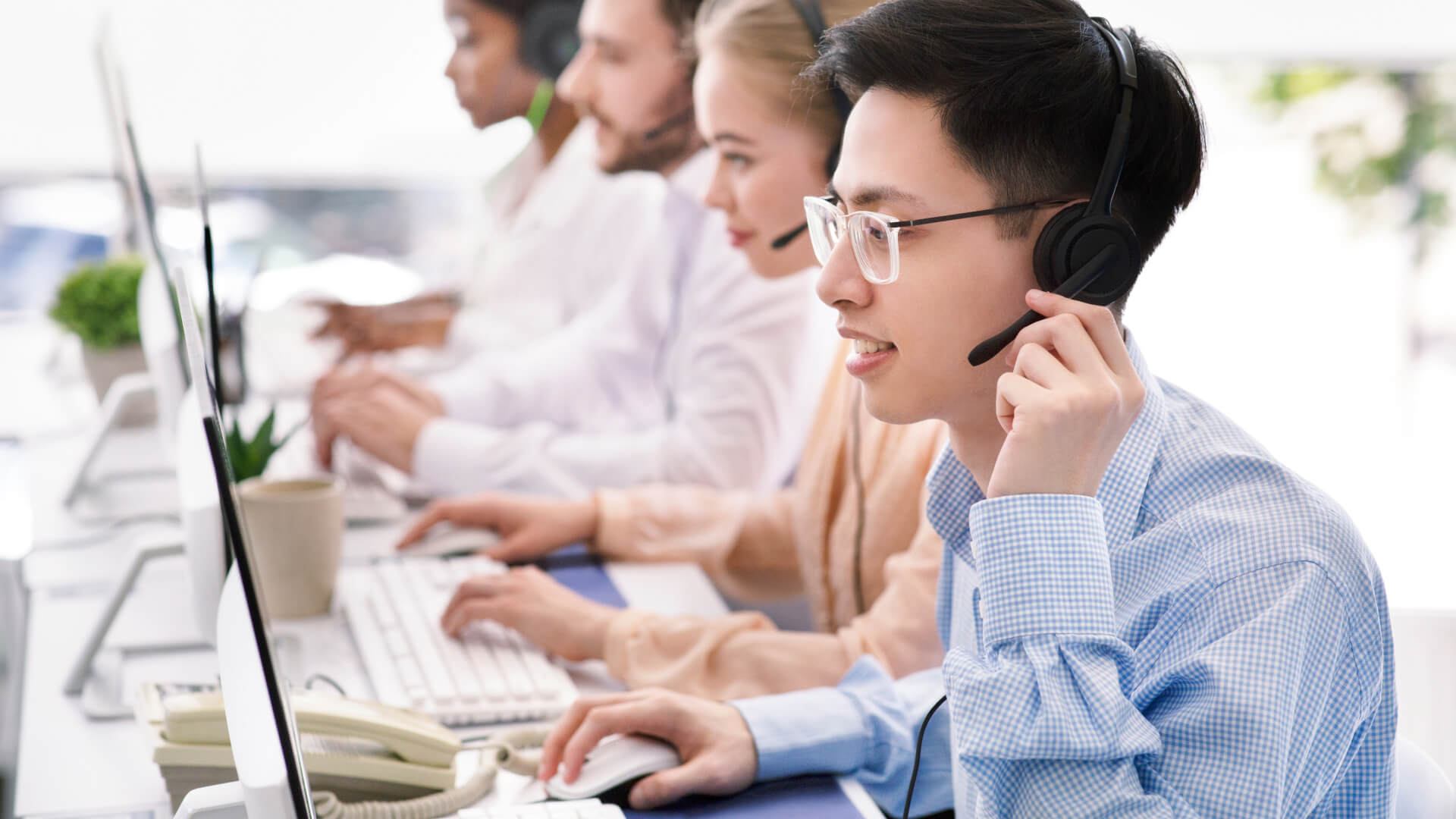 a group of people working as tech support