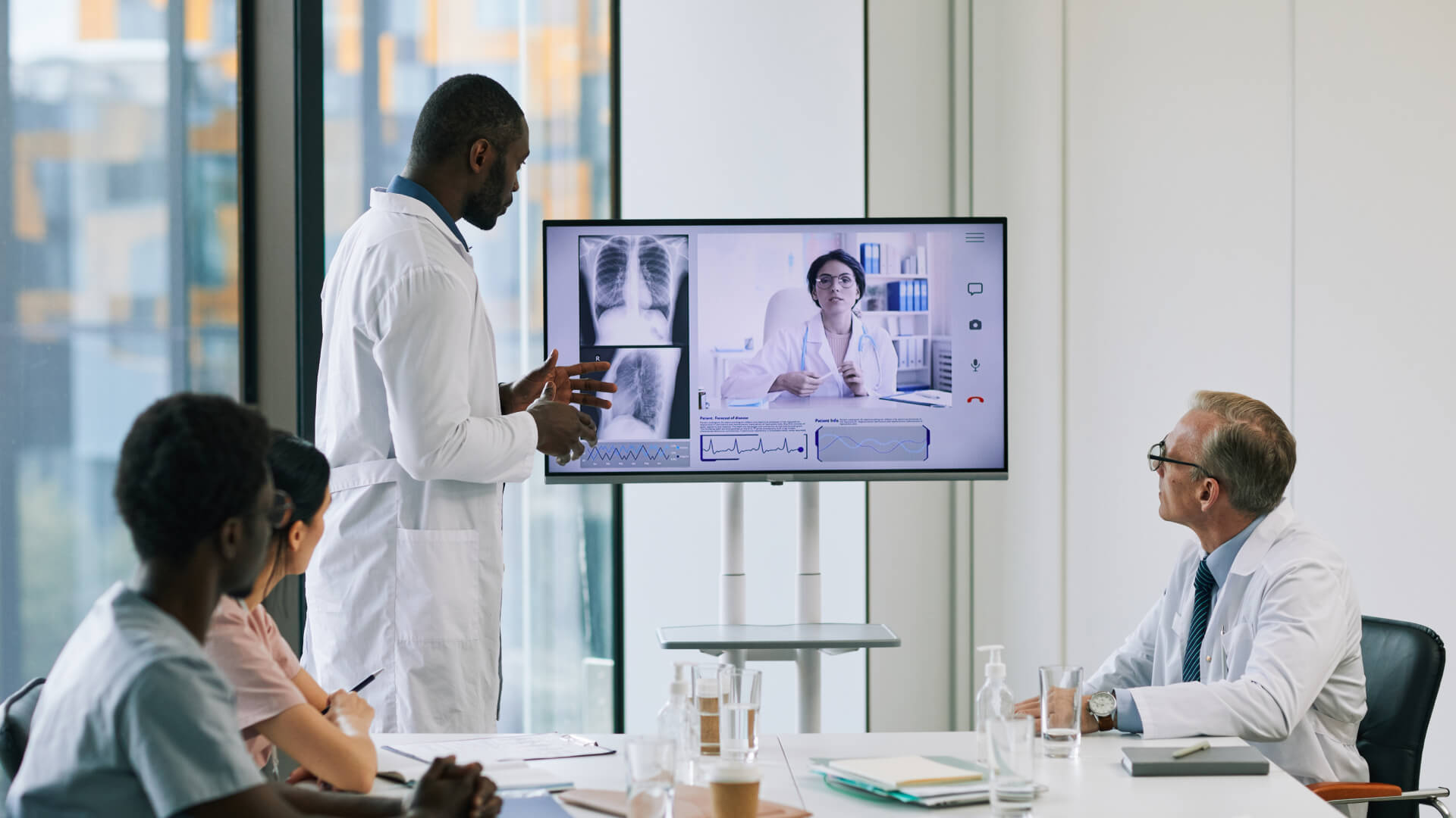 doctors and patient in a video conference