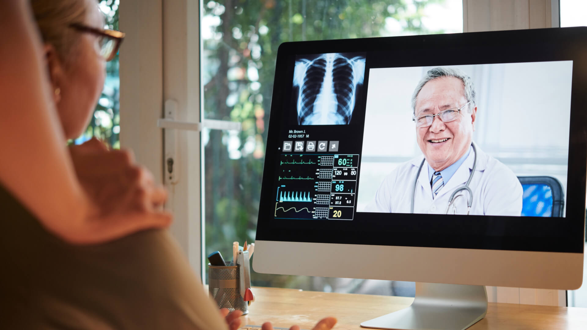 a patient taking video consultation from a doctor